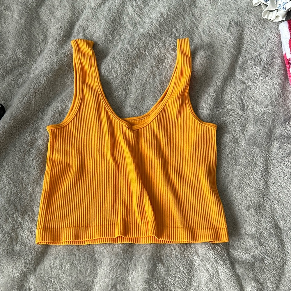 bright orange ribbed tank top